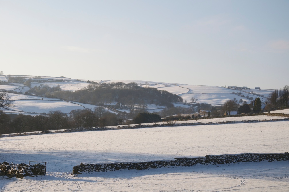 The serene Mayfield Valley, dusted gently with snow.